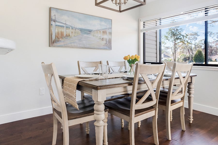 Dining area with full dinnerware sets and glassware