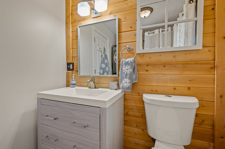 full bath with stack laundry on first level