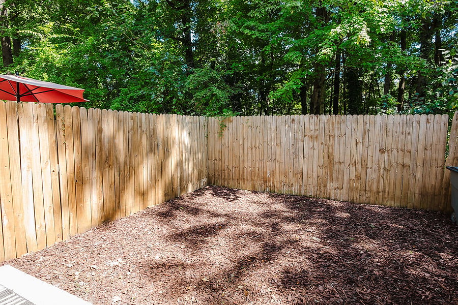 Backyard Sitting Area With Privacy Fence