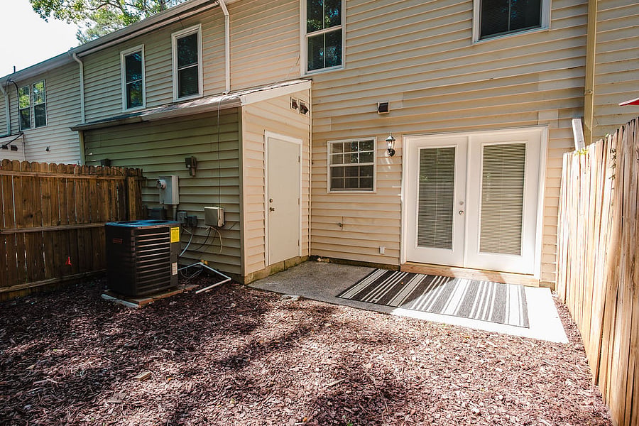 Backyard Sitting Area With Privacy Fence