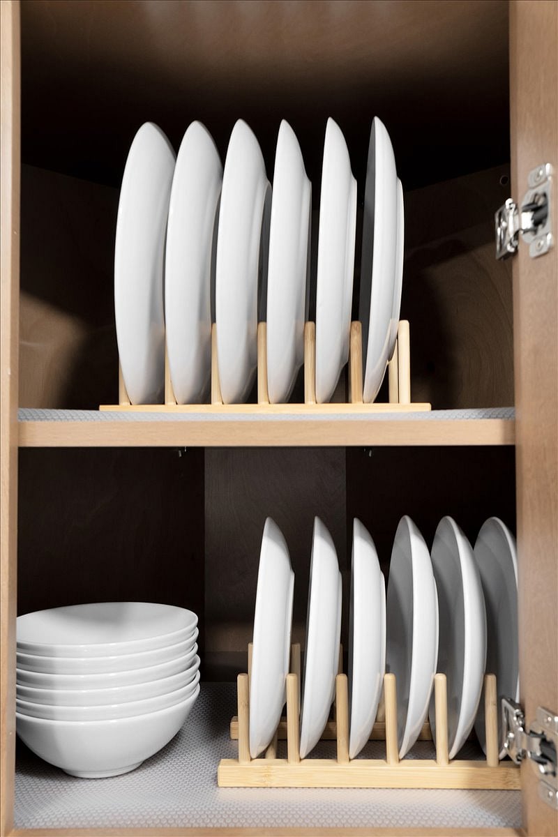 Stocked with eating-ware with plates and bowls.