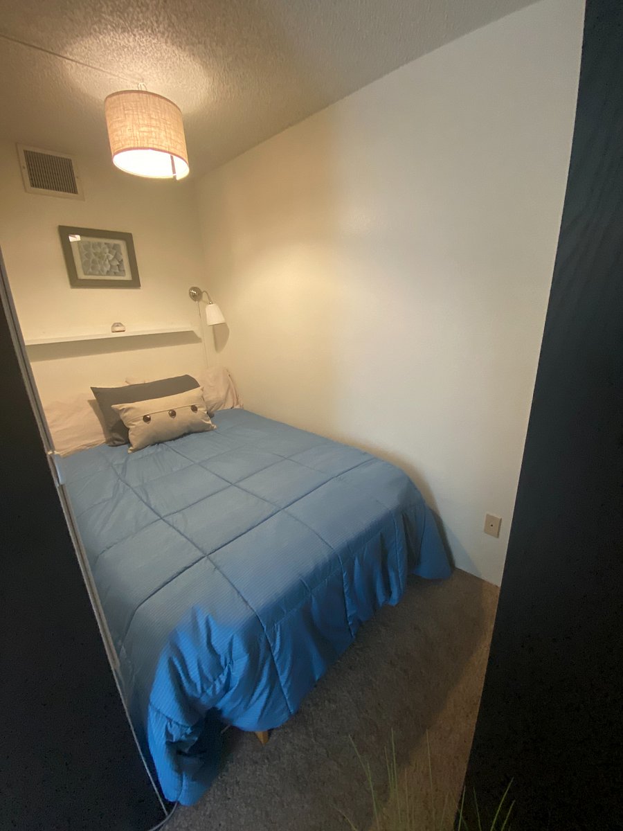 Cozy bed nook with full-sized bed!
