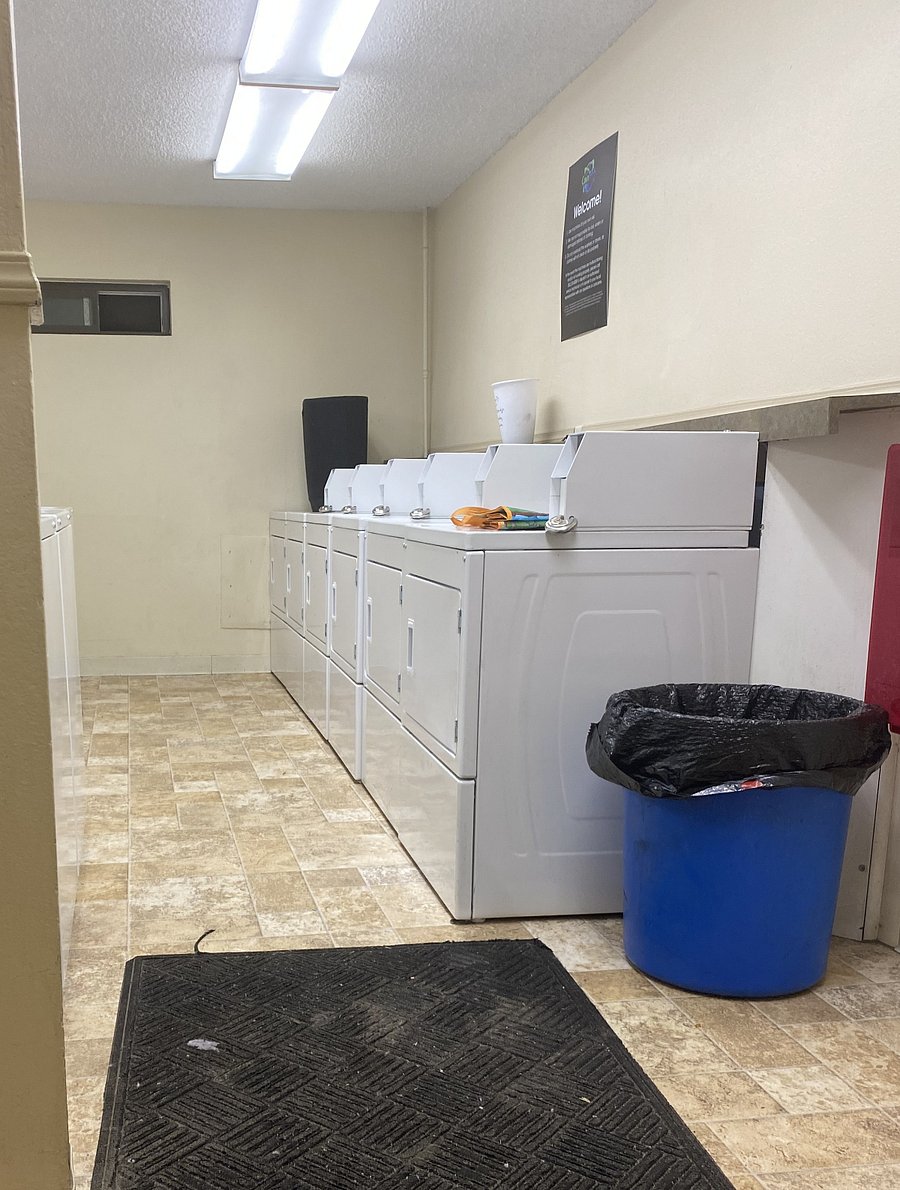 Shared coin-op or CyclePay App operated laundry in main building.