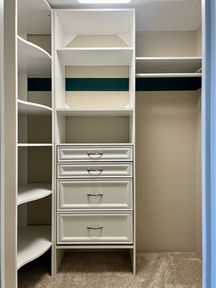 Small wall-in closet with build-in organizer system