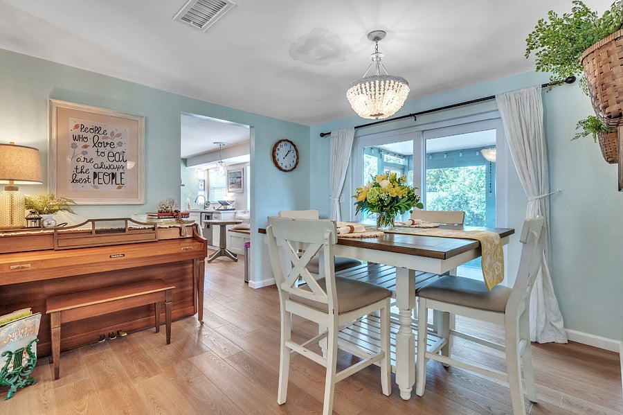 Cozy Dining area includes Baldwin Upright Piano and Record player with a nice selection of classic vinyl's to upwind to. 
