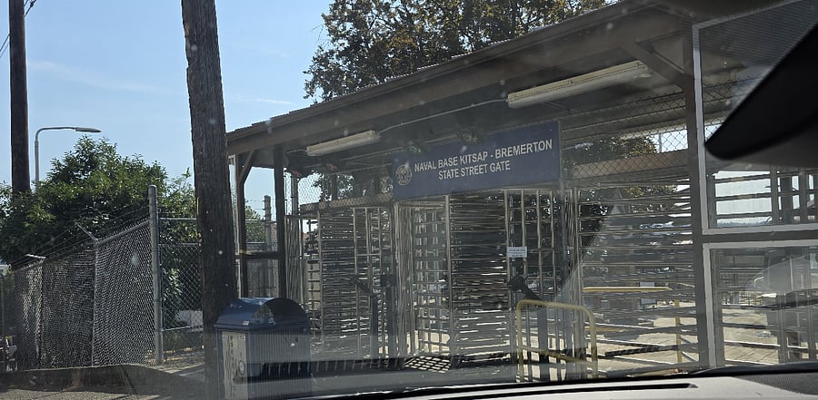Navy entrance gate, only 20' from the back stair way of the apartments, in the alley, very safe, cameras everywhere, plenty of lights at the apartment and on the way to the gate.