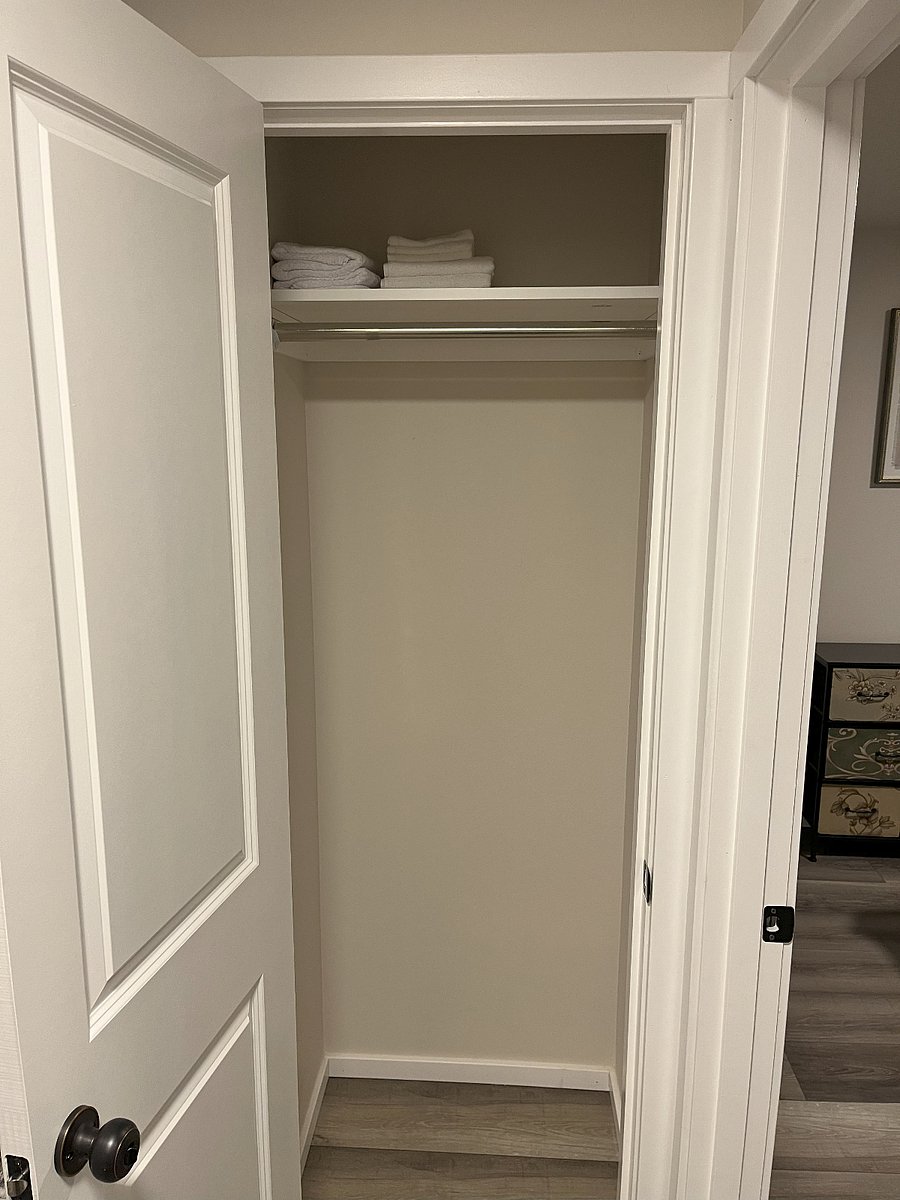 Hall closet with always new bath linens.