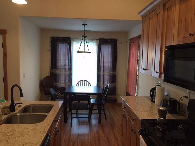 Our kitchen and eating area are bright and comfortable. 