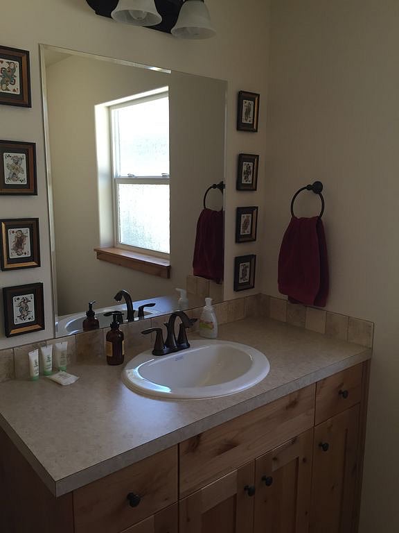 Bathroom 2 has a tub and shower. 