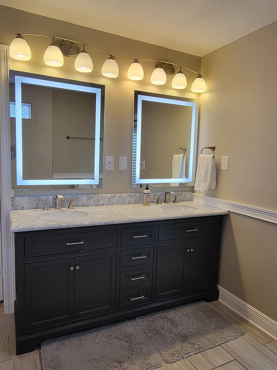 Double vanity with dimmable lighted mirrors