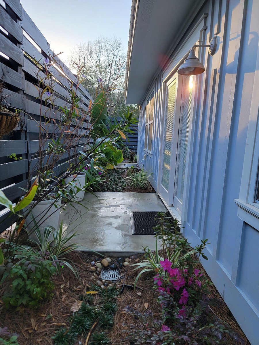 Lush landscaping and fence for privacy
