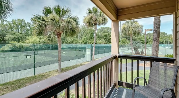 1st floor patio with view of pickleball courts
