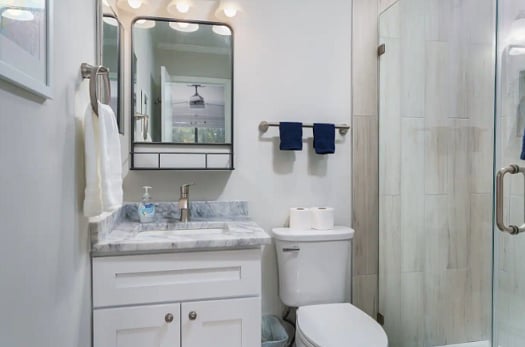 Primary bath located within the bedroom
