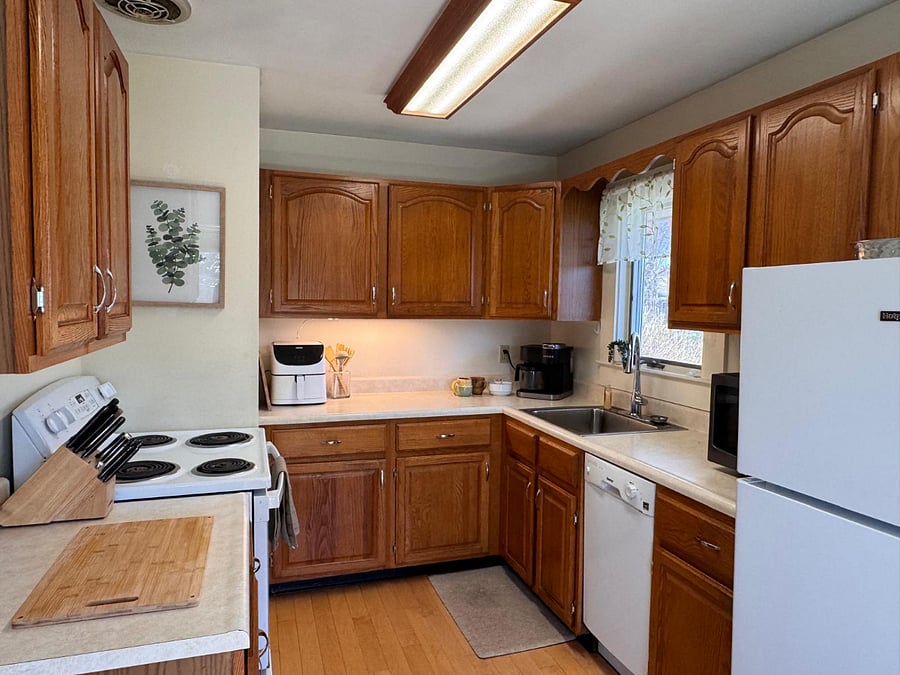 Outfitted for a foodie. All of the pots, pans, and utiensils necessary to create a masterpiece. Common utilities included: dishwasher, Keurig, air fryer, stove, refigerator, and microwave.