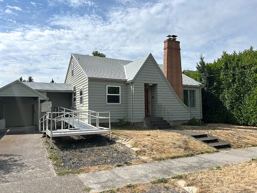 Accessible ramp from carport to side entrance.