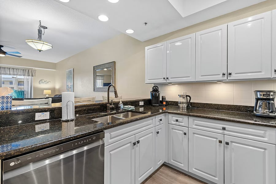 Updated kitchen - fully stocked with cooking utensils and implements