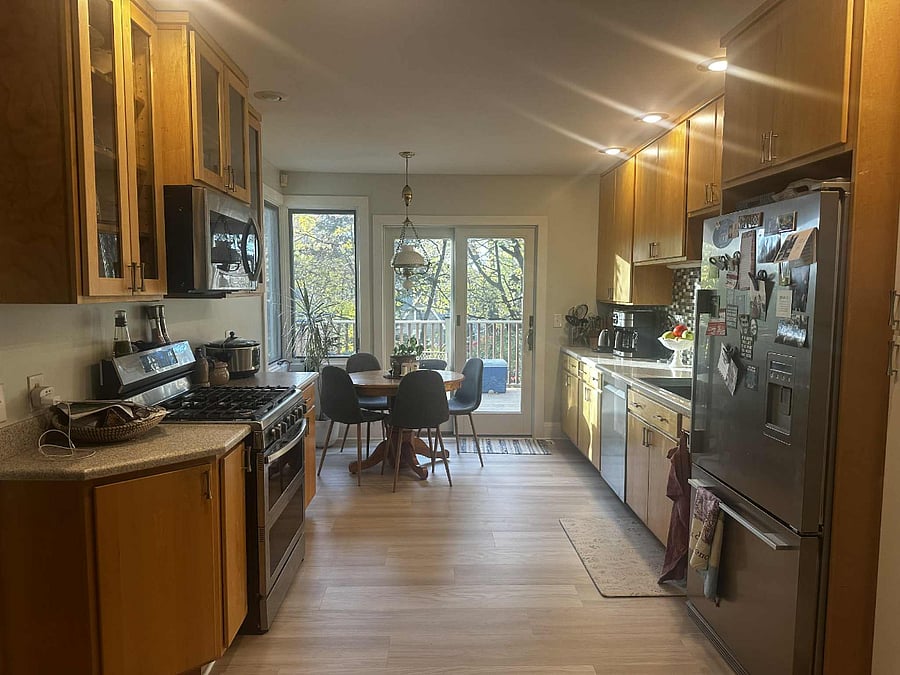 Full size kitchen with duel gas stove, microwave, full size fridge and dishwasher