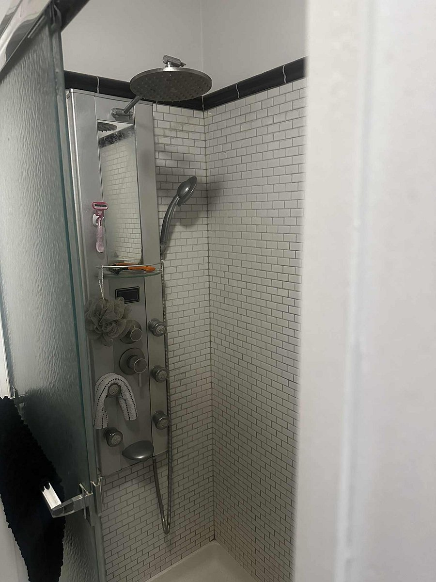 Bathroom-single vanity, bidet, and large rain shower head
