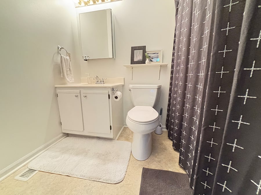 Full bathroom, with shower/tub combo.