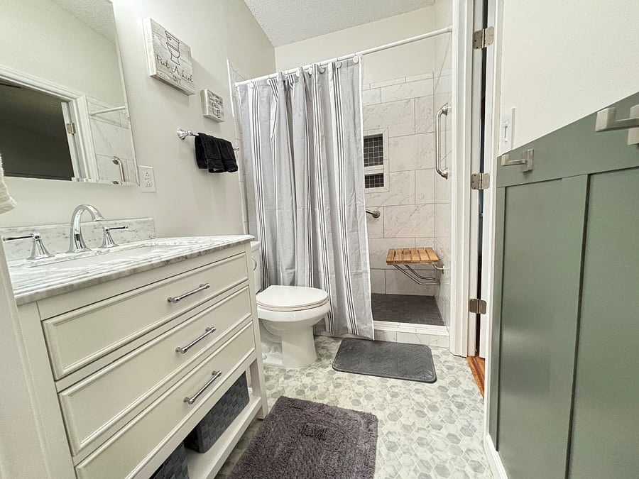 Updated full bathroom with walk-in shower.