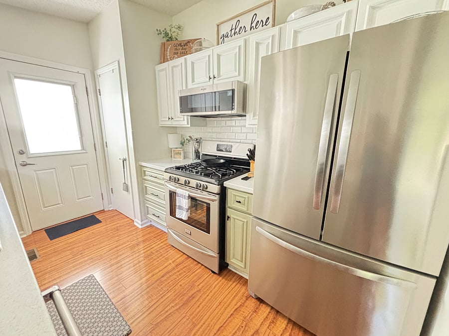 Gas stove and oven, with a pantry.