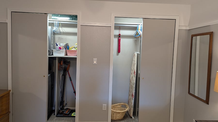 cleaning supplies, vacuum, iron board and iron
