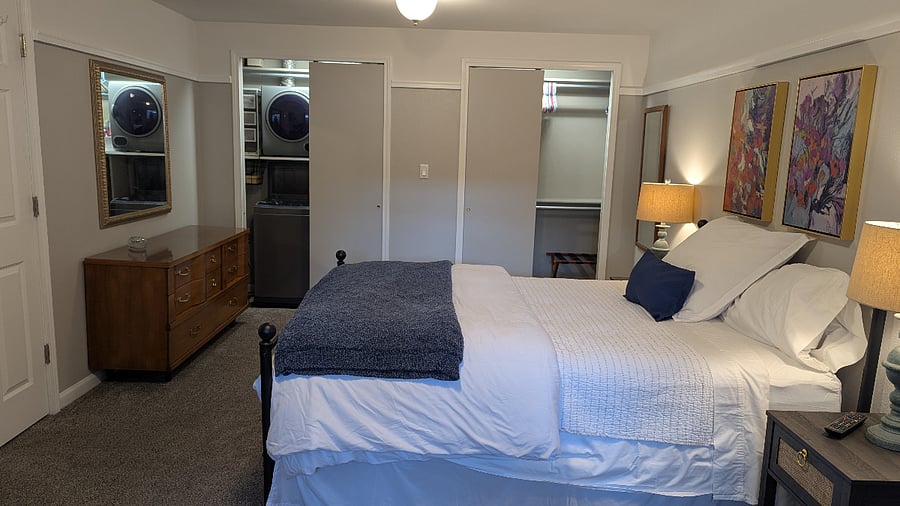 in unit washer and dryer with ample closet space and hangers
