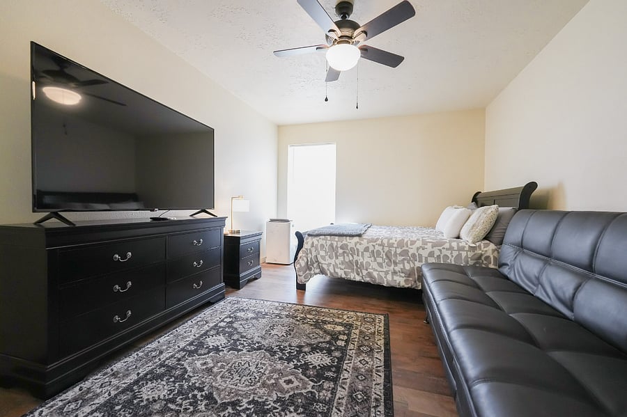 The next best thing to a master suite is having a bedroom with your own relaxation space.