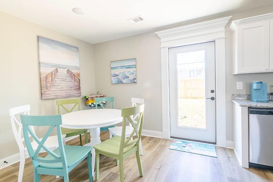 Dining area next to kitchen and back door
