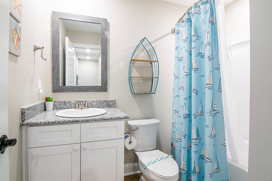 Full bathroom upstairs with tub