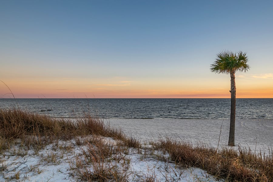 Walk across the street to the powder sugar sand!