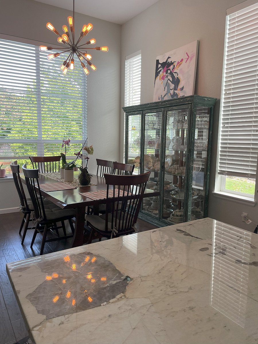 Kitchen island and eat-in kitchen area.