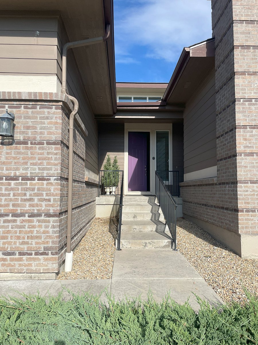 Front door and steps up the entrance.