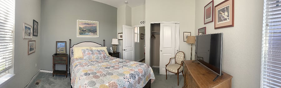 Sunny and private bedroom with east and north facing windows.