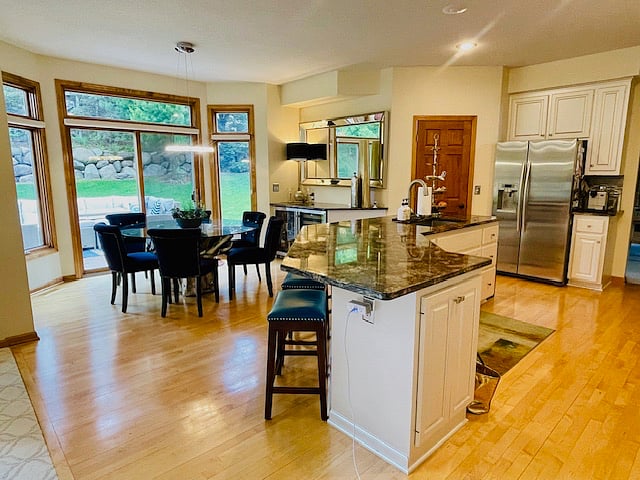 Eat-in gourmet kitchen with large island. Open floor plan.