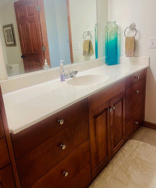 Full Private Bath with Tub, Shower, and Large Vanity.