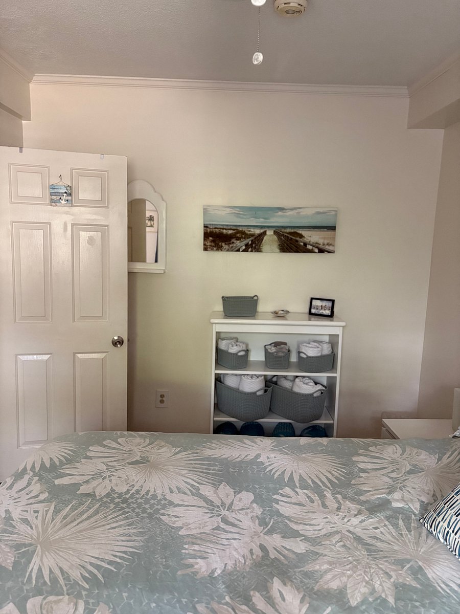 Master bedroom towel shelves