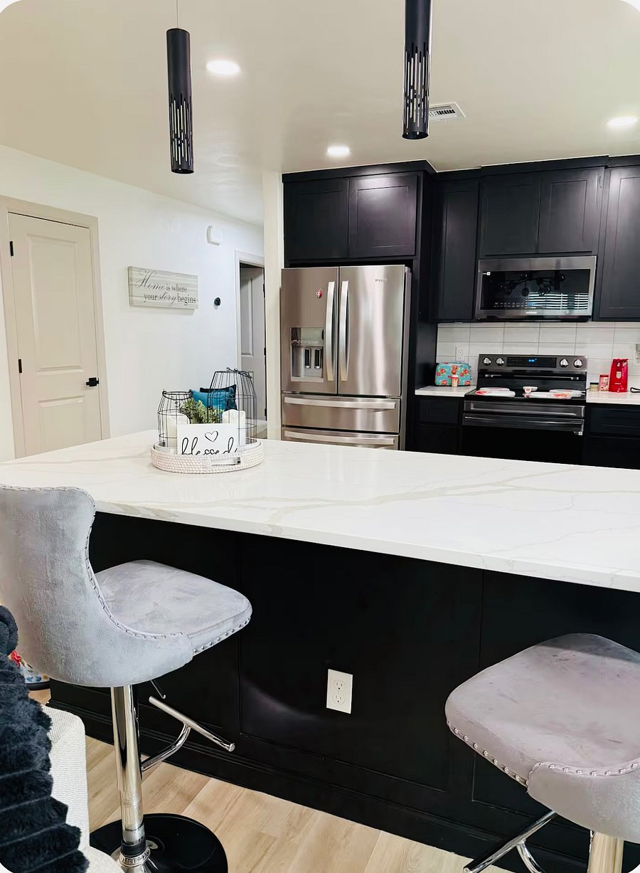 Fully equipped kitchen with smart appliances. Stove that is also an air fryer, microwave that is also an air fryer, touchscreen dishwasher, spacious refrigerator with filtered ice and water.
