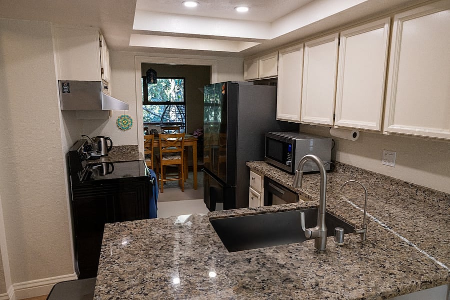 Fully equipped kitchen with granite counter tops, brand new appliances and deep kitchen sink.