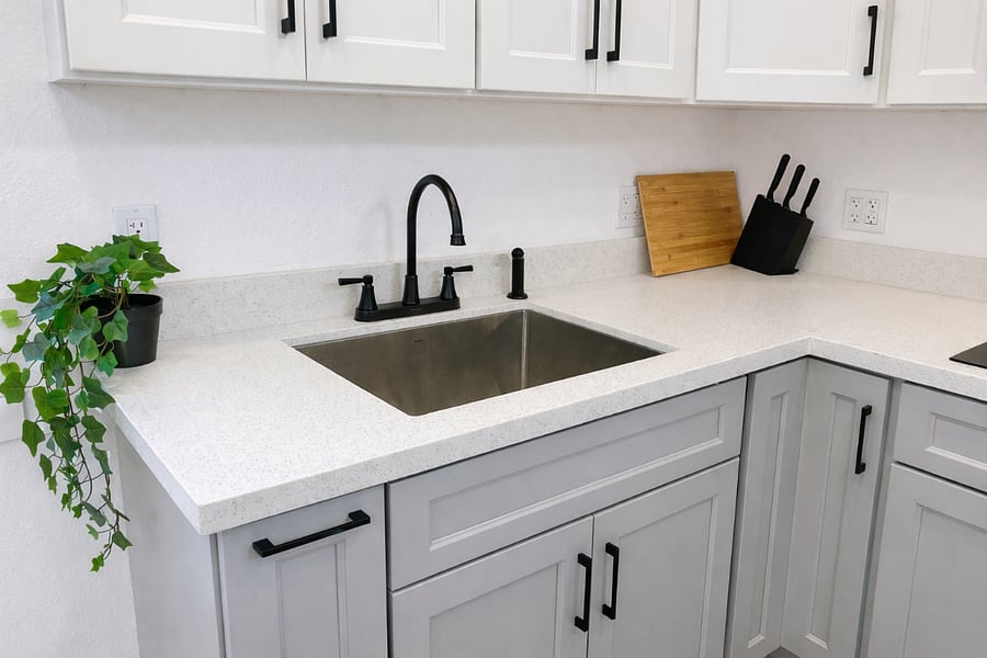 Kitchen stocked with cookware, utensils, and essentials