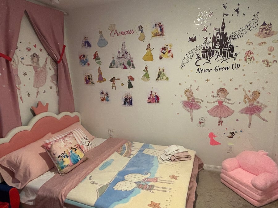 Princesss full sized bed with Disneys theme princess n stories on the wall;)