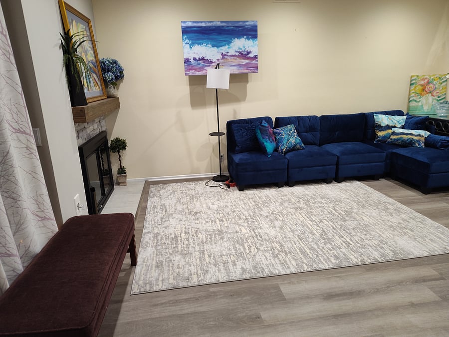 Enter home from attached garage or front door into living . TV is on wall behind picture ( each bedroom has TV)