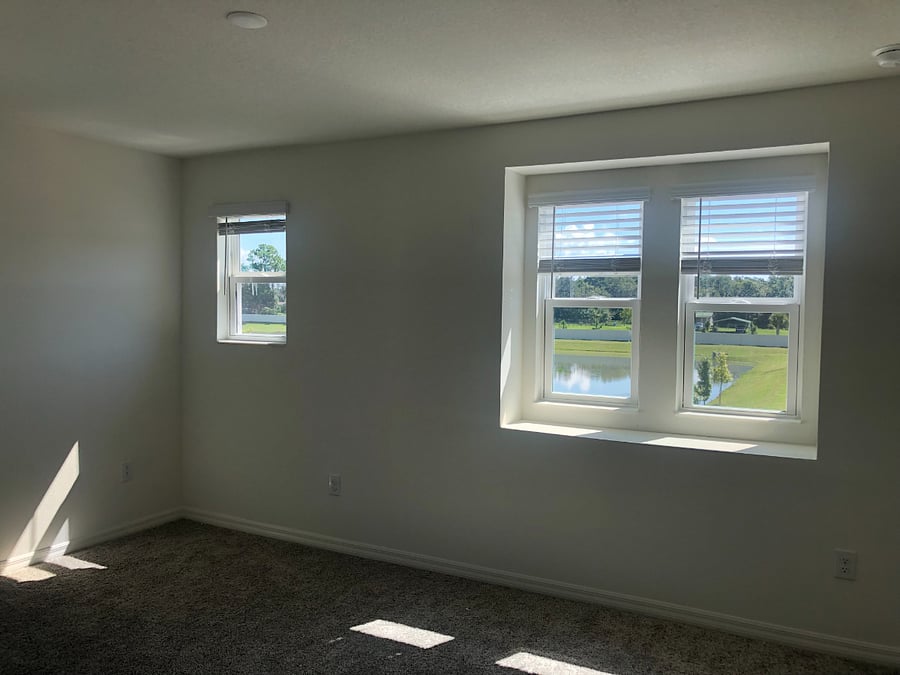 This is one of the upstairs bedrooms. It has multiple windows and is available furnished or unfurnished.