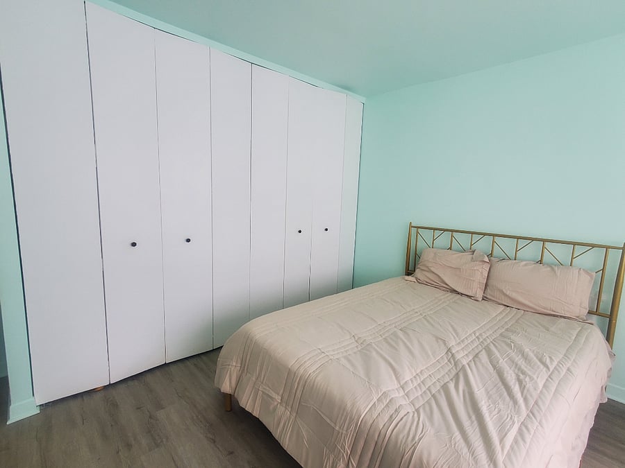 Bedroom with full closets