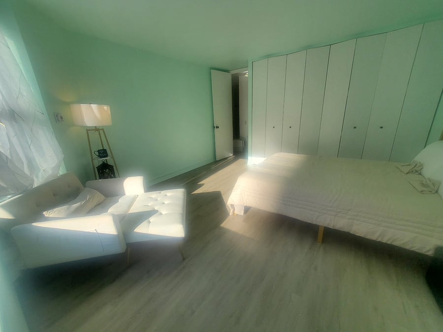 Bedroom - Wall to Wall Closet space and hanger racks