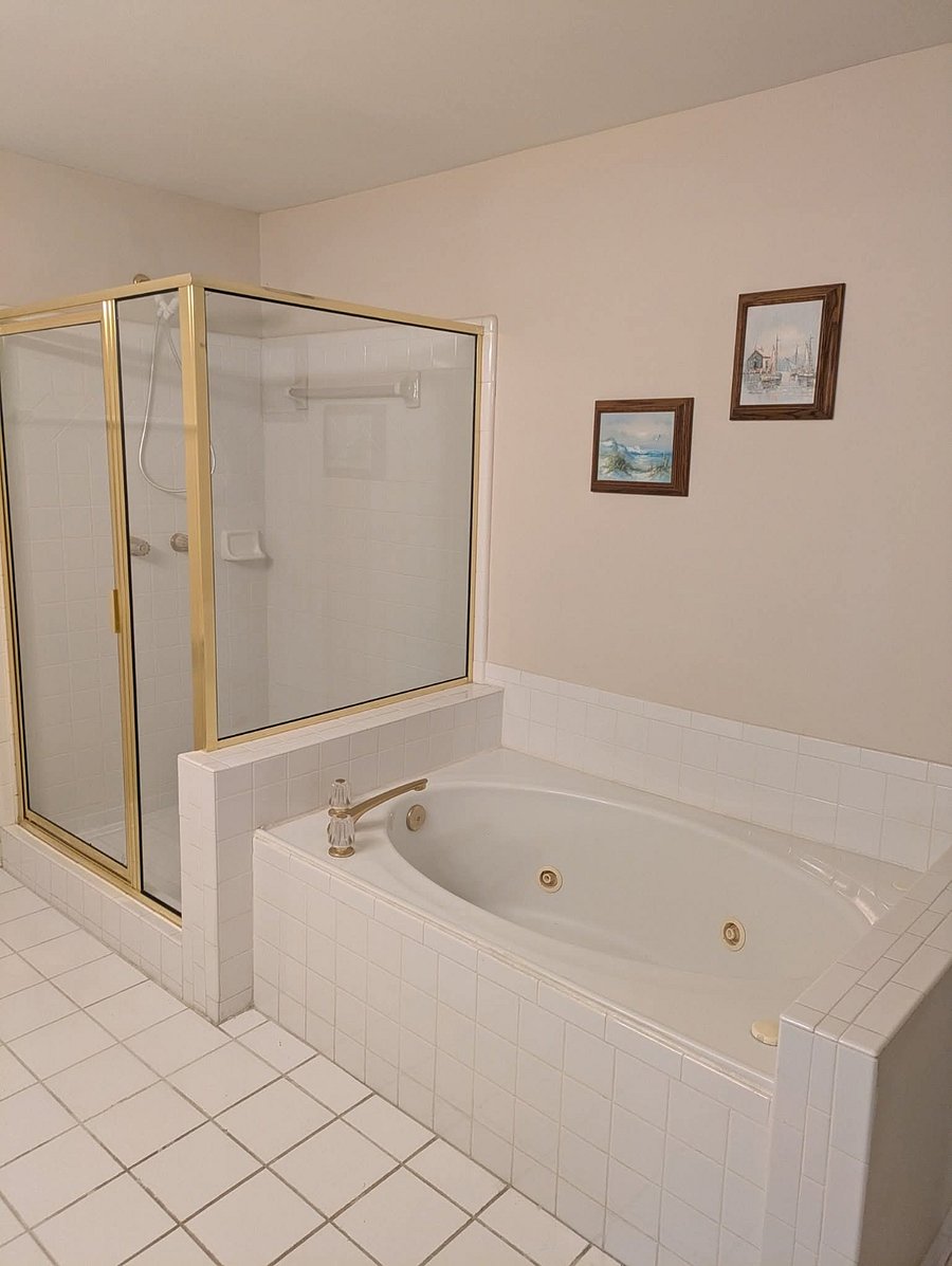 Bath with walk-in shower and whirlpool tub