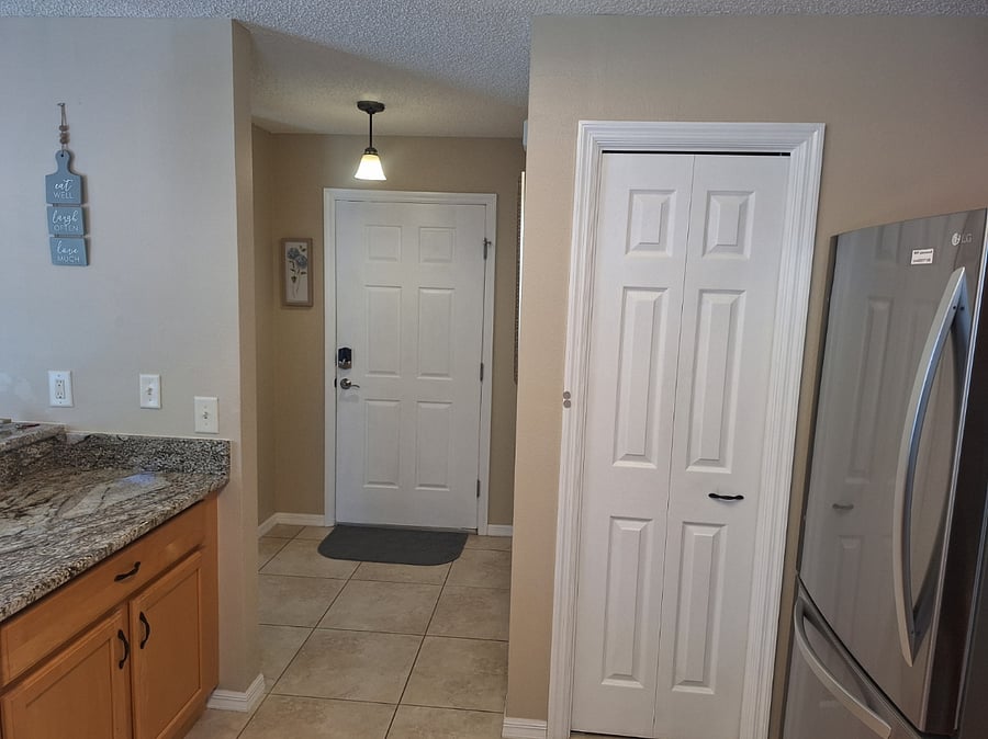 From kitchen to pantry door and Entry door