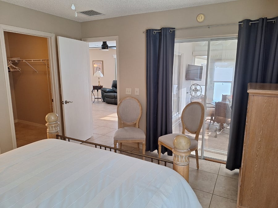From Primary to Lanai. Has connecting glass door