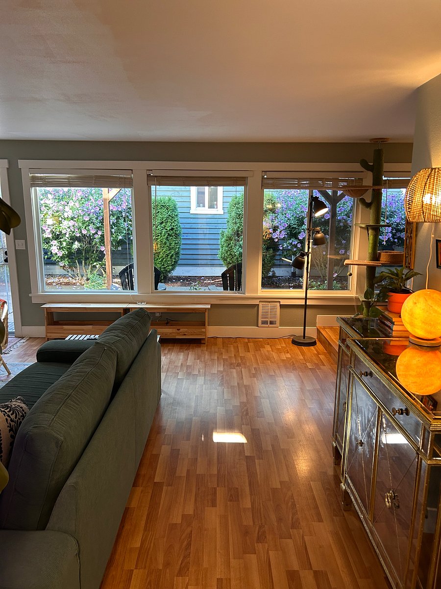 Front of condo, living room to left, dining/kitchen to right