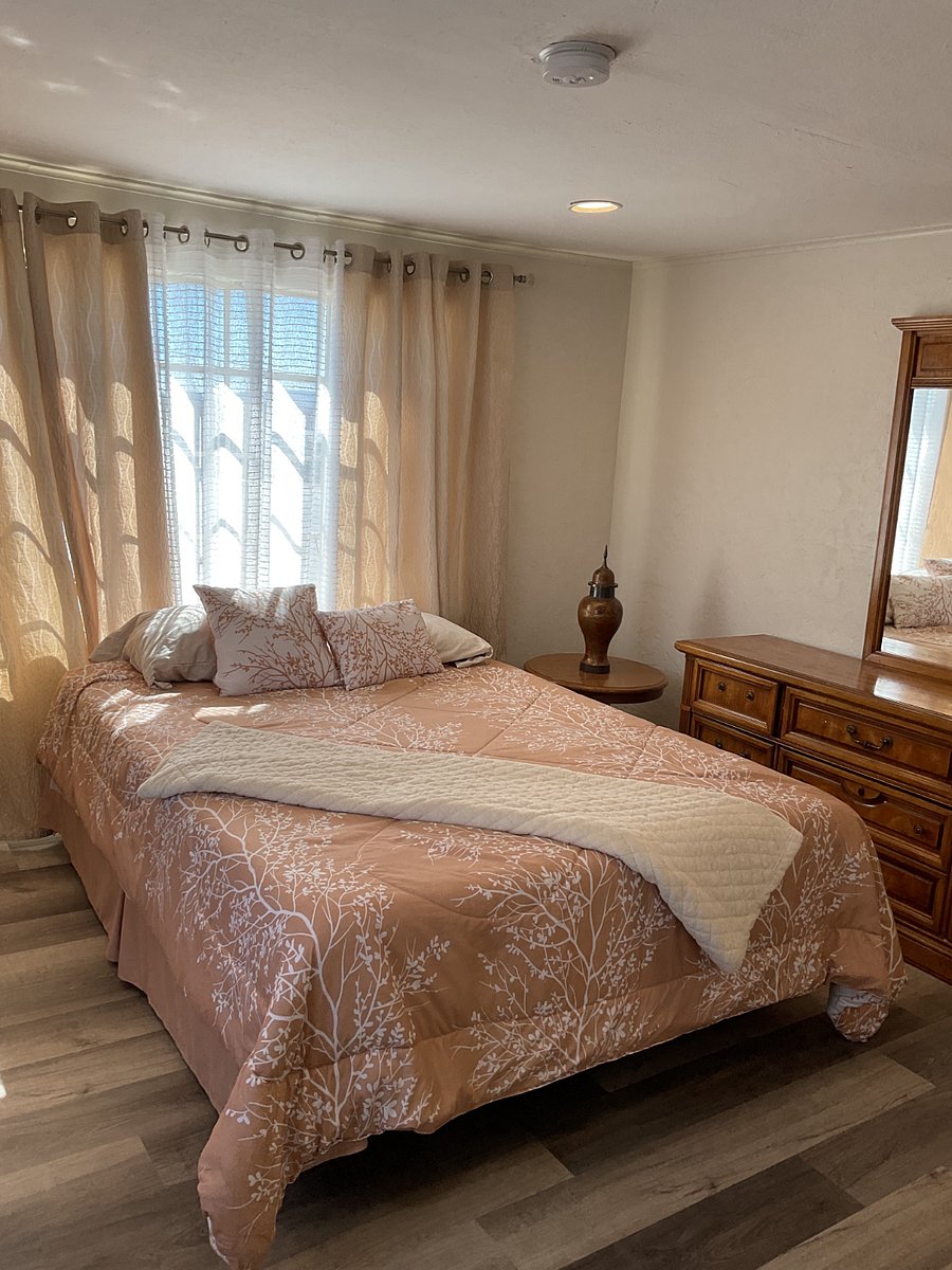 Bedroom 1 with queen bed, dresser, nightstand and large closet.